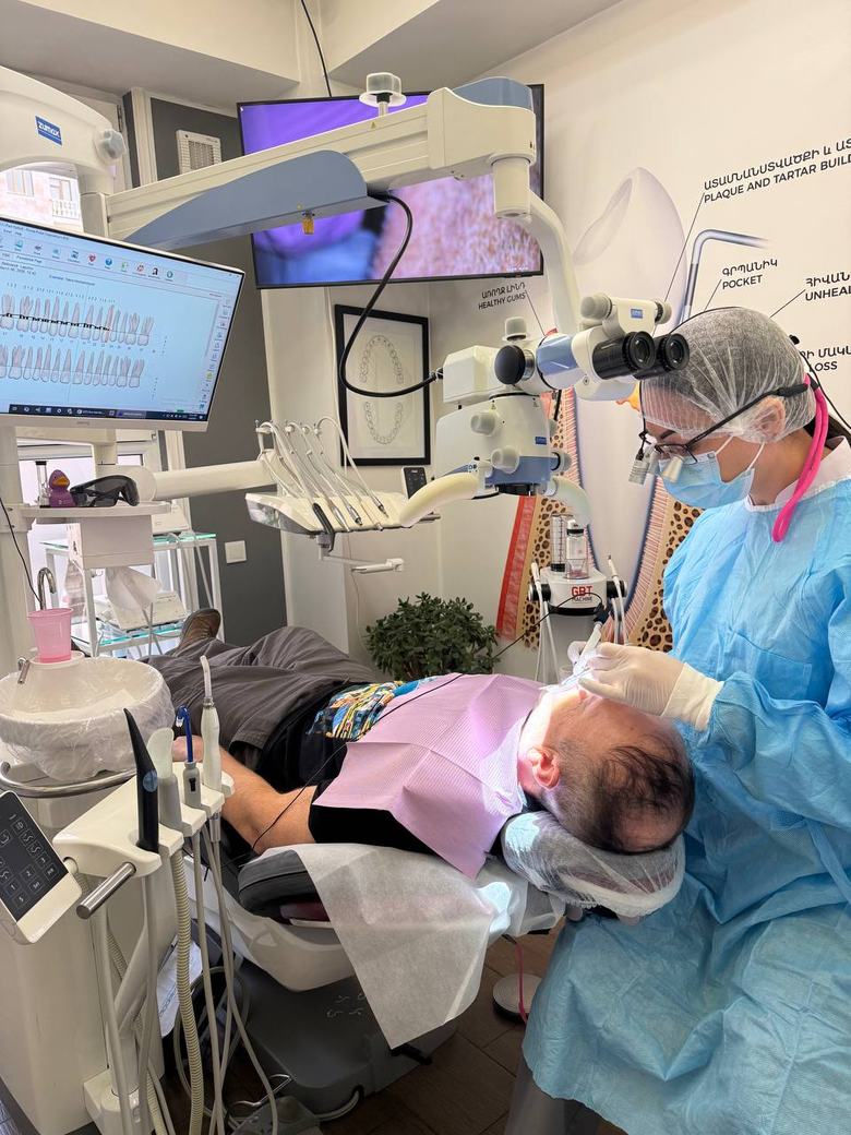GBT procedure performed under a microscope at White Castle dental clinic